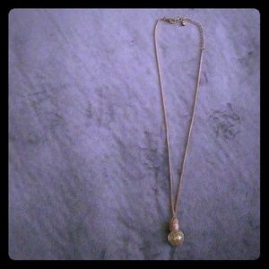 Gold potion necklace